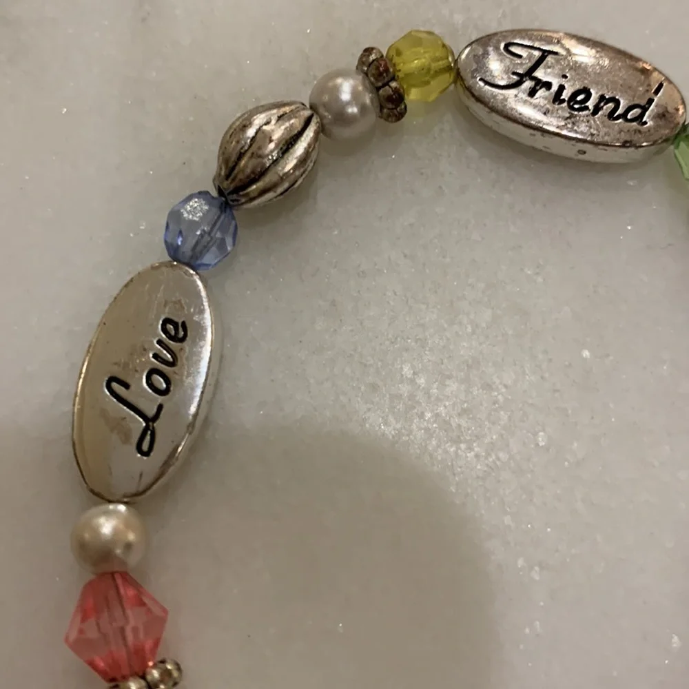 Love,Friend,Forever bracelet‎ plus 2 with orange beads.One is stretch.